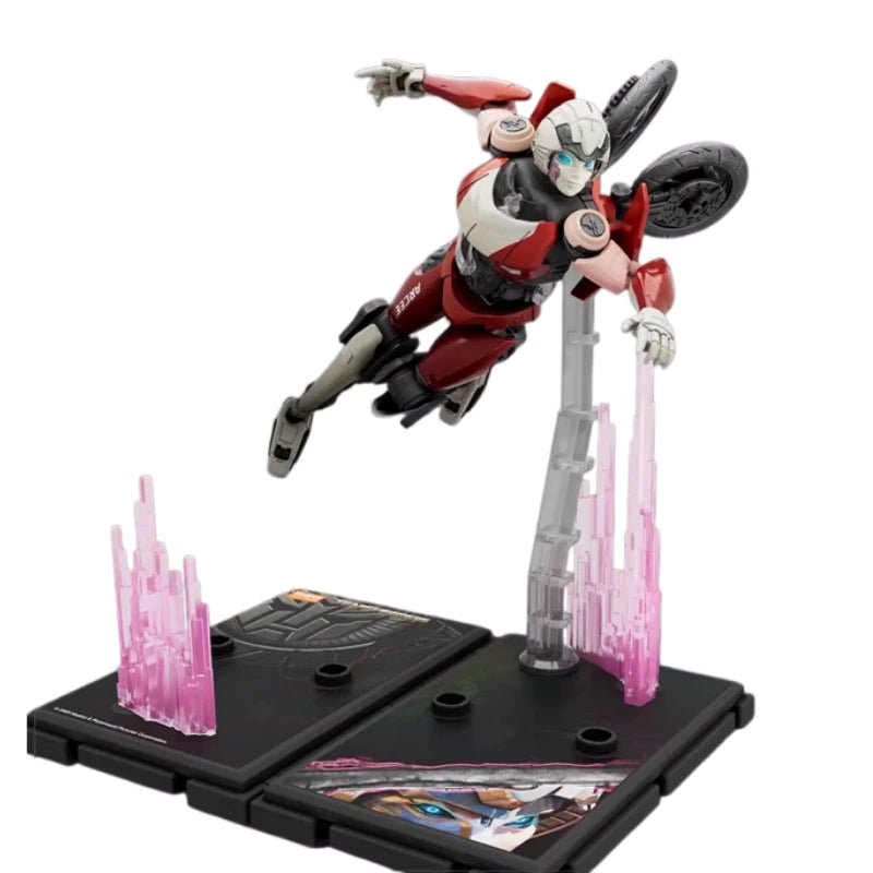 Figurina Transformers Arcee Vol Acrobatique — Robot rosa e grigio base luminosa