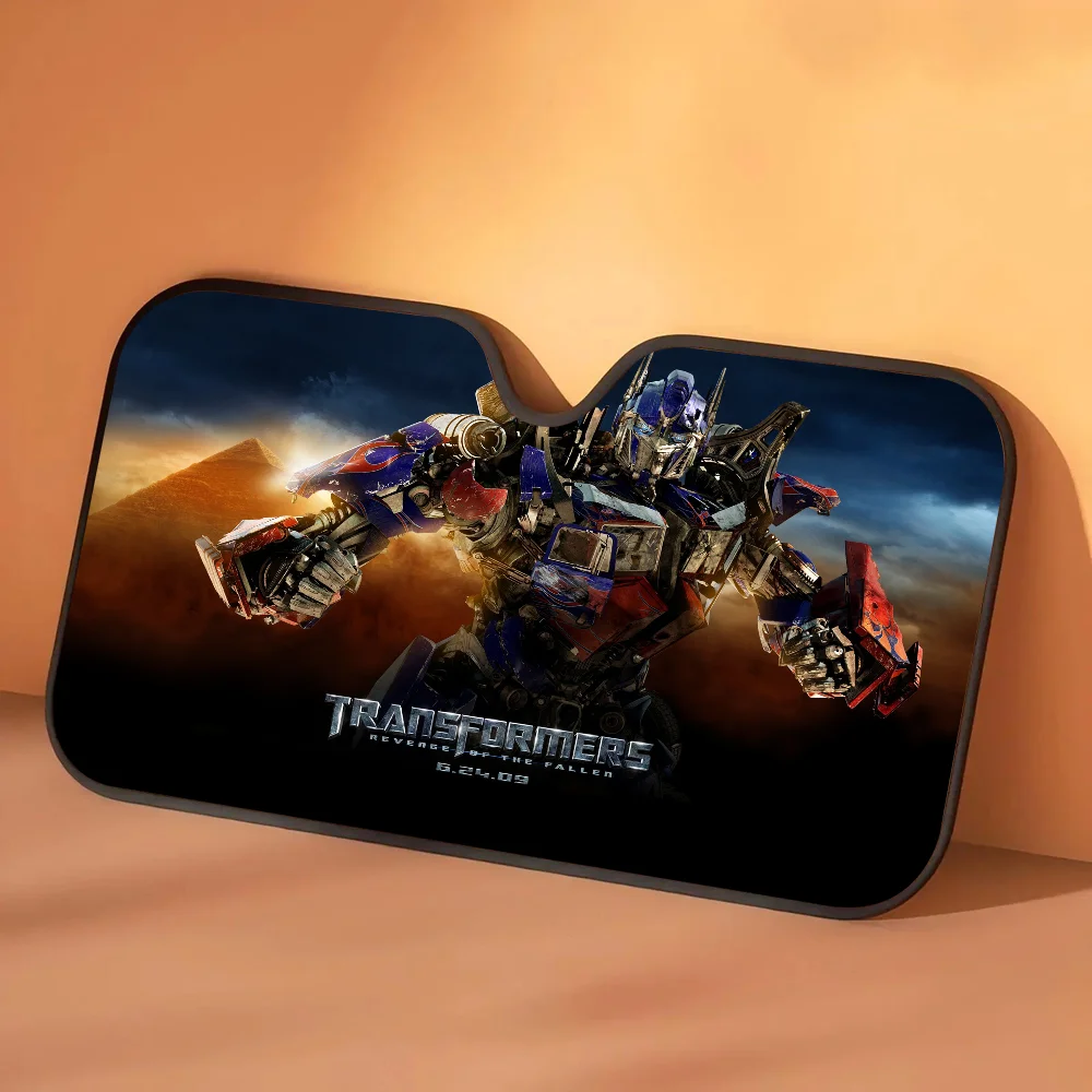Parasole Transformers Optimus Prime nella tempesta di sabbia — Protezione solare per auto nel deserto dorato