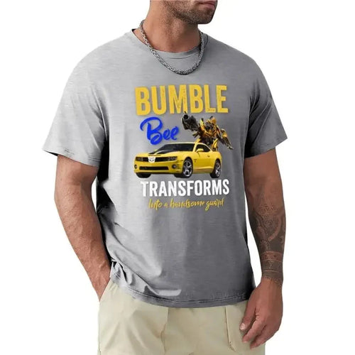 T-shirt gris homme avec Bumblebee, robot et voiture jaune, texte coloré en anglais – Transformers.