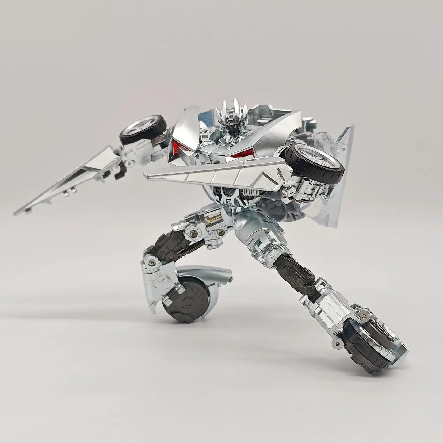 Figurina Transformers Sideswipe War Dancer — Ballerino di Guerra Rosso e Argento