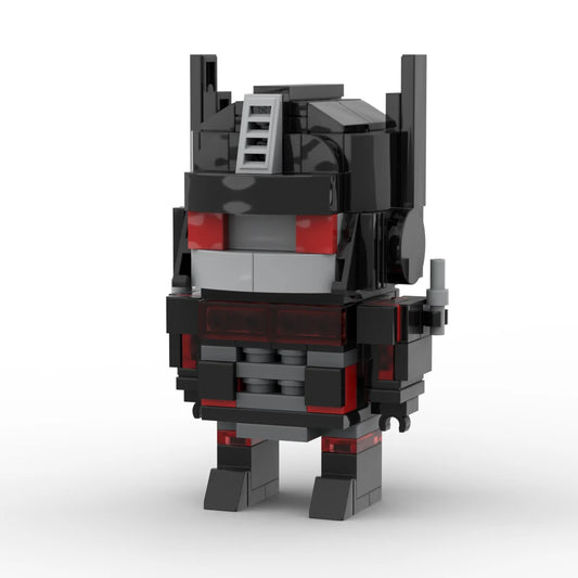 Figurina Transformers StrikerNoir versione IDW — mattoncino antracite, operazioni speciali