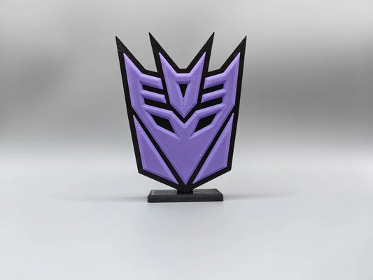 Targa Transformers Decepticon viola — Decorazione da scrivania Silhouette dell'emblema