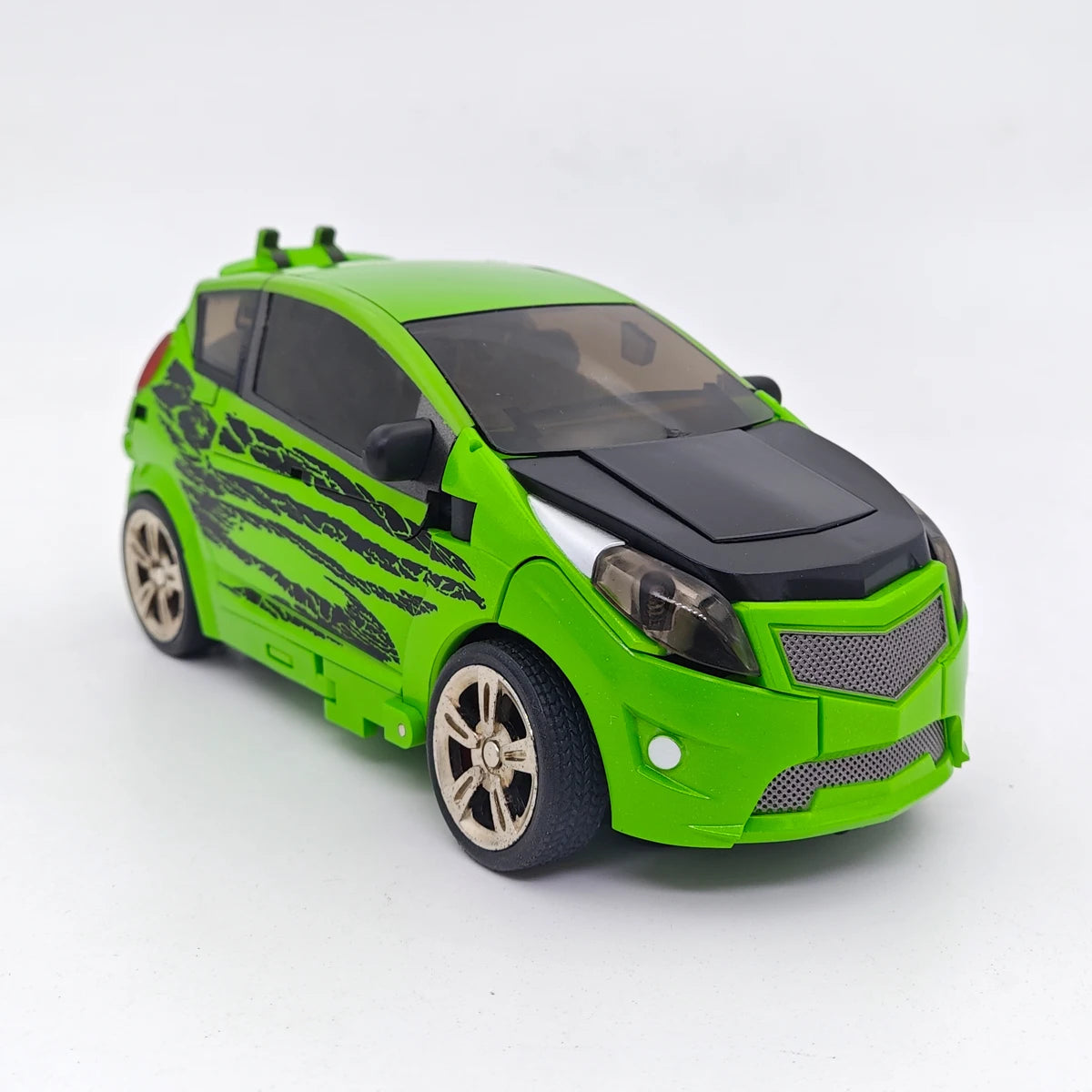 Figurine Transformers Skids e Mudflap — Duo di Gemelli Verdi Dumb Unique Toys