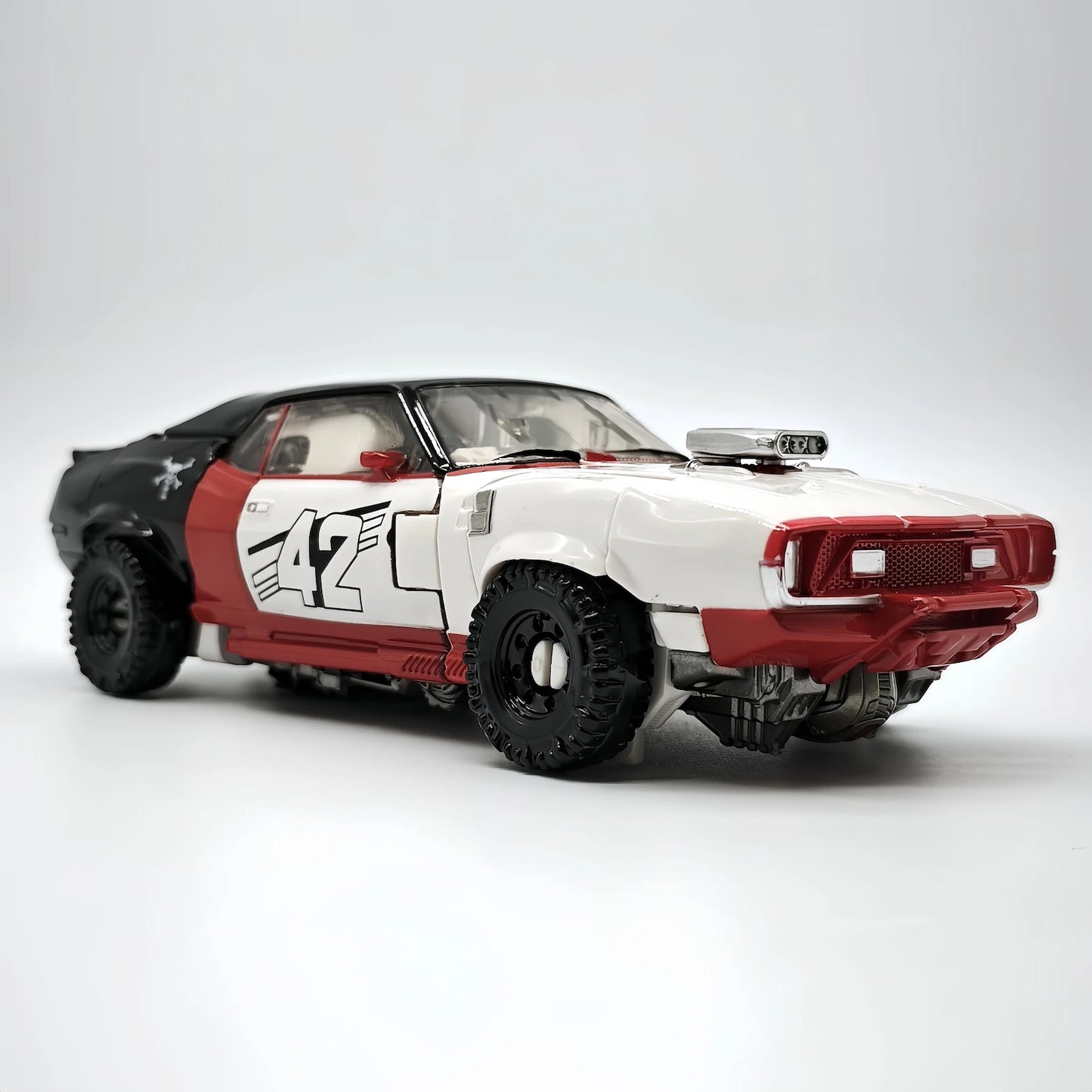 Figurine Transformers Dropkick Rouge TW1033B — Decepticon Voiture Articulé
